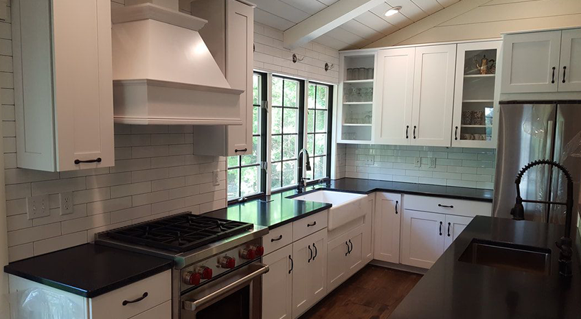 Spacious Waukesha kitchen featuring center island, pendant lighting, and hardwood floors