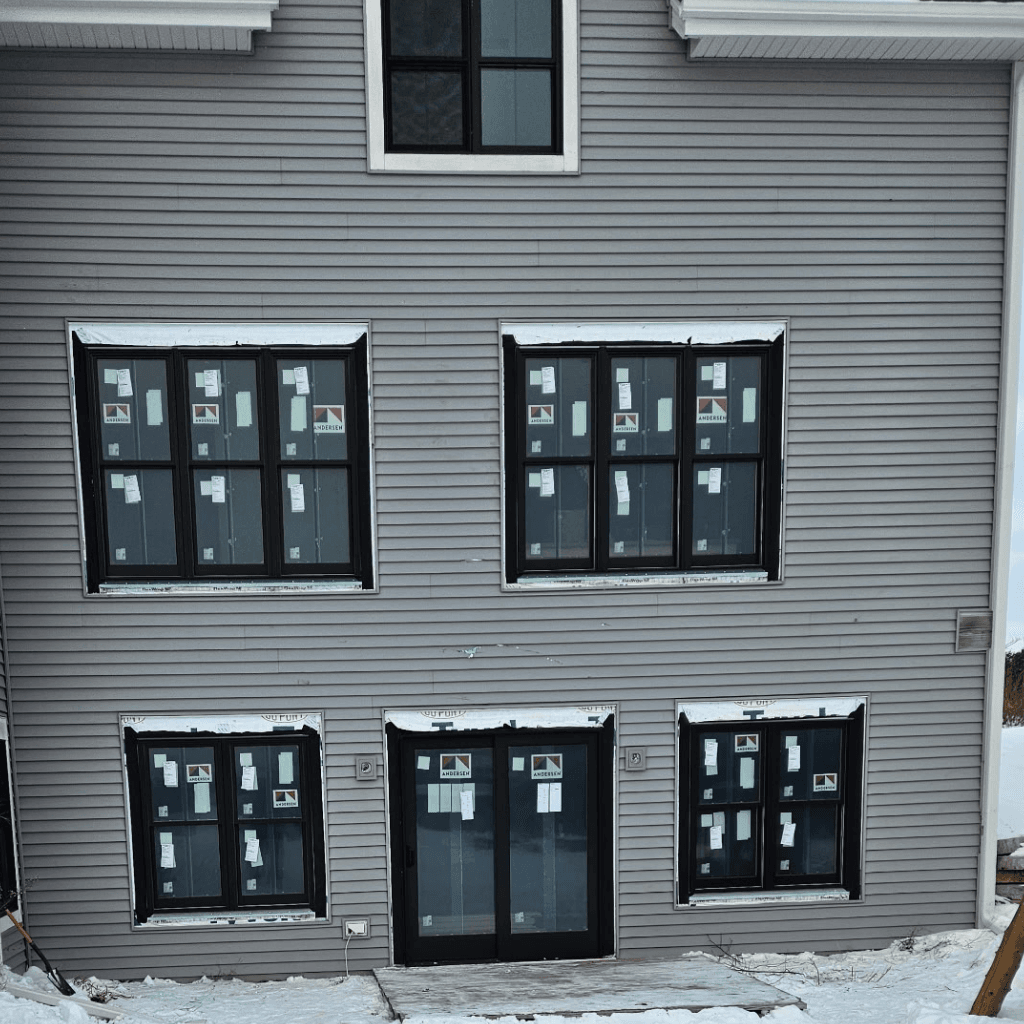 New bay window added to a Mayville home overlooking a small front yard